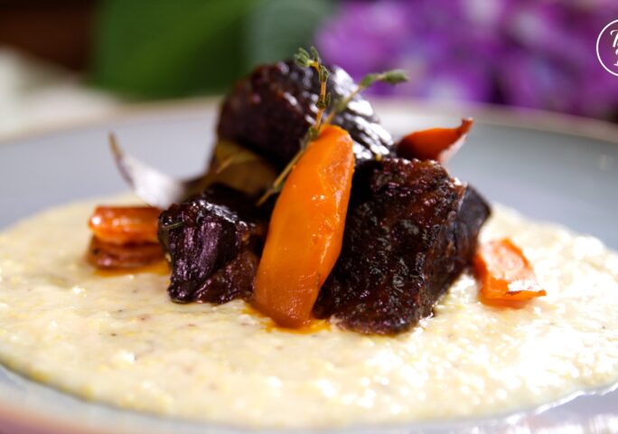 Red Wine Braised Short Ribs Served With Cheesy Polenta
